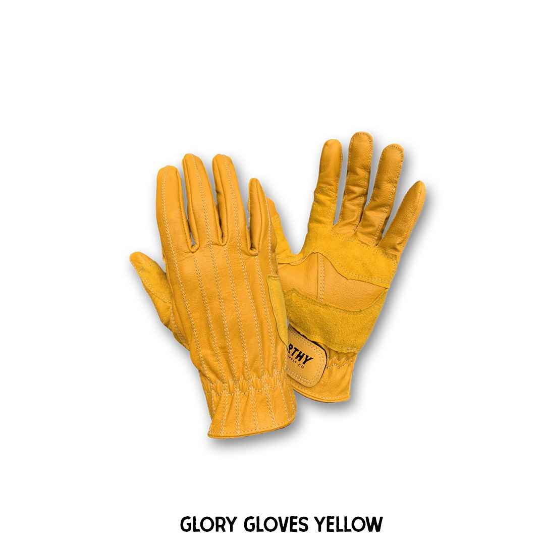 A pair of brown and yellow leather gloves with visible stitching and the brand name 'NORTHY' on the wrist strap.