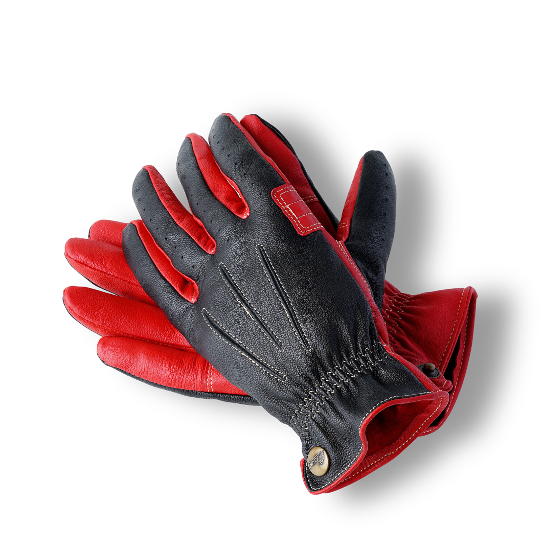 A pair of black leather gloves designed for riding, showing the palm and fingers with the brand name 'Nobleman' visible.