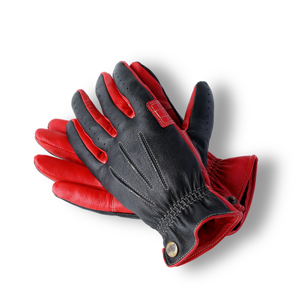 A pair of black leather gloves designed for riding, showing the palm and fingers with the brand name 'Nobleman' visible.